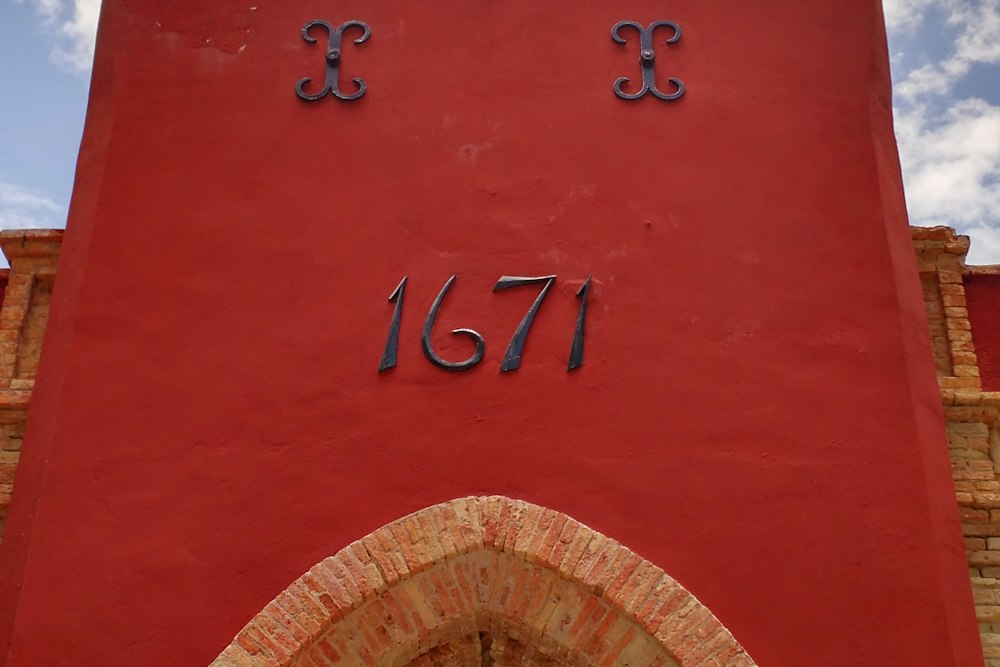 The red walls of Fort Christian in Charlotte Amalie, dated 1671