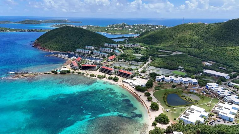 Aerial view of Sapphire Bay, its reef and the resort, where you can go snorkeling right off the beach on St. Thomas